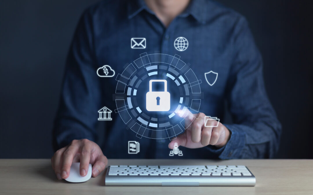 A person working on a keyboard and mouse touching the screen with various cloud-related icons.